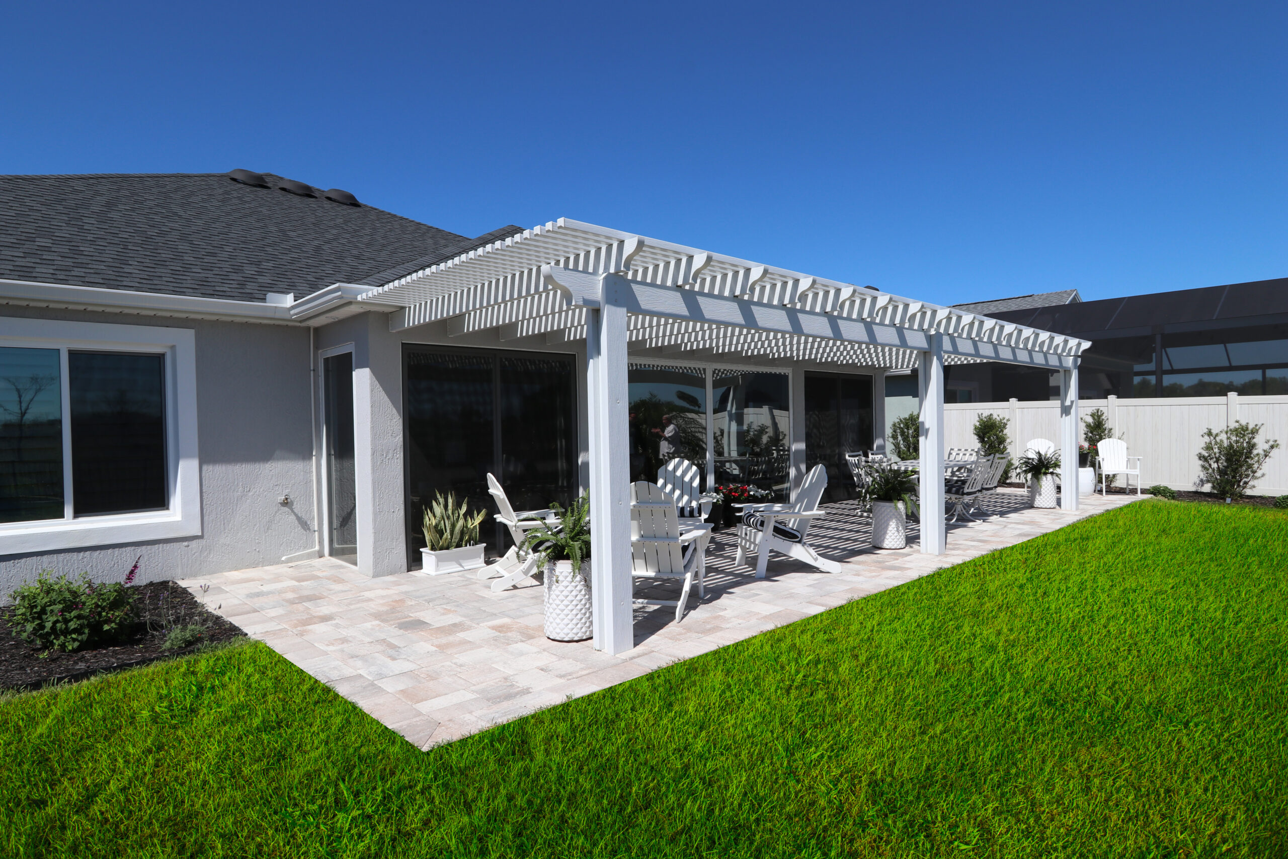 backyard pergola with outside furniture